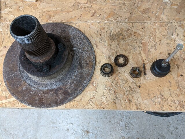 offside hub with homemade grease cap tool