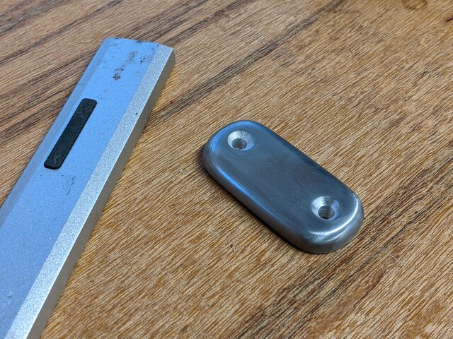 partially drilled escutcheon